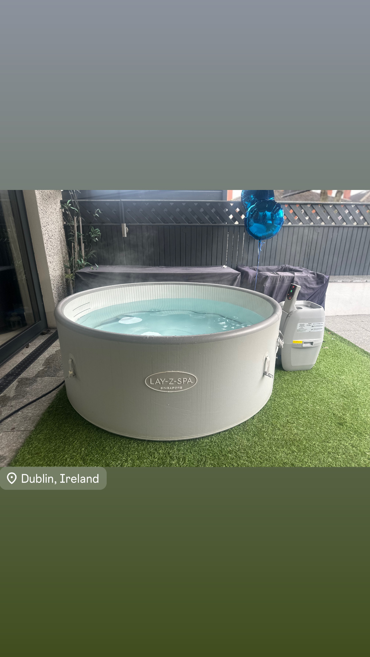 Hot tub garden party setup with gazebo and speaker