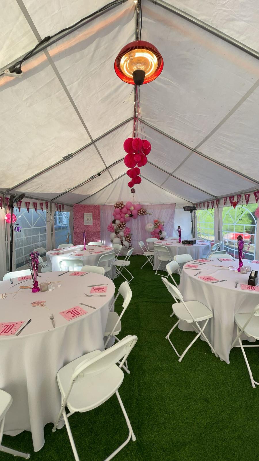 Decorated marquee with bouncy castle for communion or wedding afters